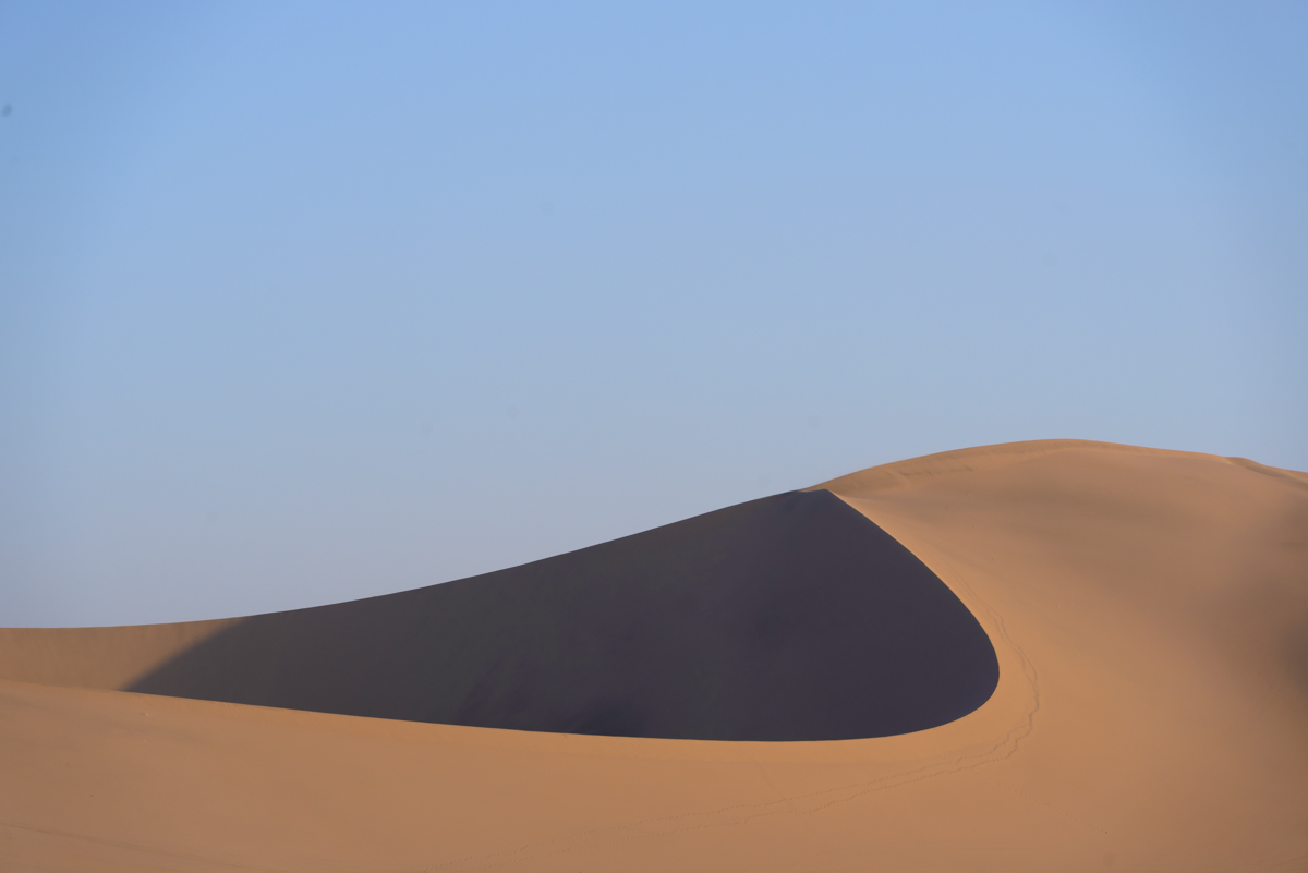  'modernity', (my title), top of a sand dune in the ica desert, peru. 1200 x 801 by mostlyoverland 